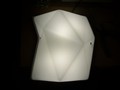 Translucent sconce adds art and mood lighting